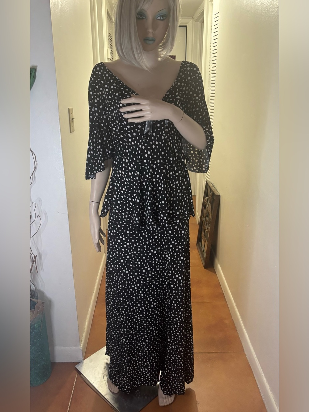 Women’s set top & skirt polka dots black & white. Front has a tie, bell sleeves